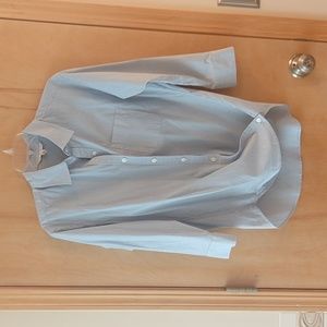 Fun Cabi three quarters length sleeve shirt with button hemmed bottom.